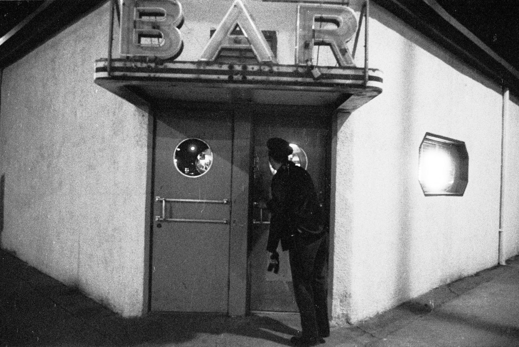 Billings police officer at the Silver Dollar Inn, October 1975
